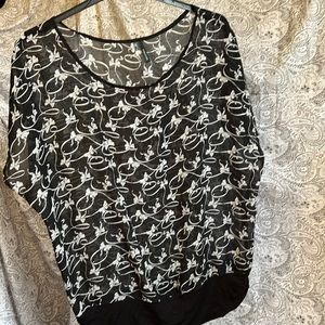 Black sheer top with cute bow detail
